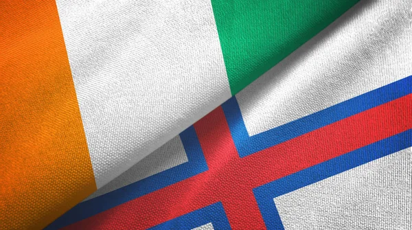 科特迪瓦象牙海岸和法罗群岛两面旗帜纺织品 — 图库照片