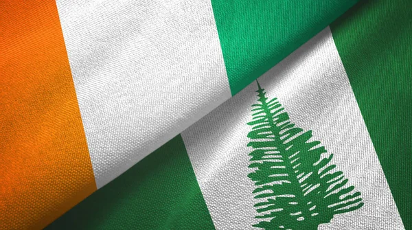 Ακτή Ελεφαντοστού Ακτή Ελεφαντοστού και Νήσος Νόρφολκ δύο σημαίες υφάσματος — Φωτογραφία Αρχείου