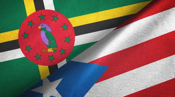 Dominica en Puerto Rico twee vlaggen textiel doek, stof textuur — Stockfoto