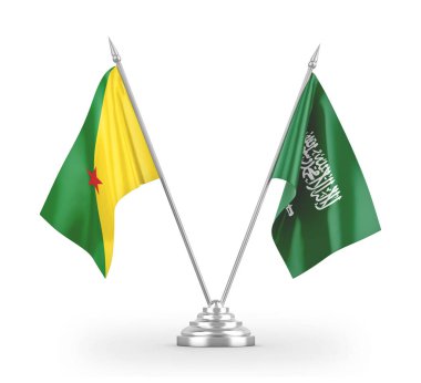 Saudi Arabia and French Guiana table flags isolated on white 3D rendering