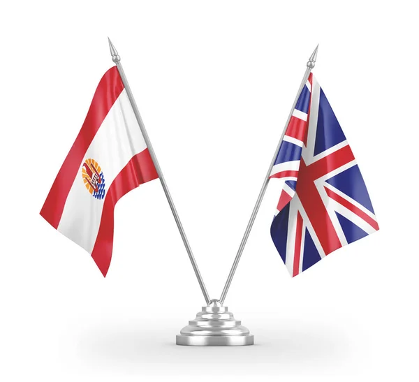 Bandeiras de mesa da Polinésia Francesa e do Reino Unido isoladas em renderização 3D branca — Fotografia de Stock
