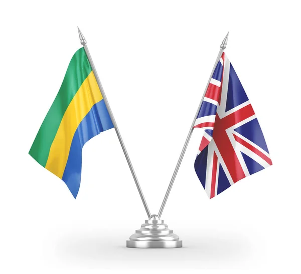 Bandeiras de mesa do Reino Unido e Gabão isoladas em renderização 3D branca — Fotografia de Stock