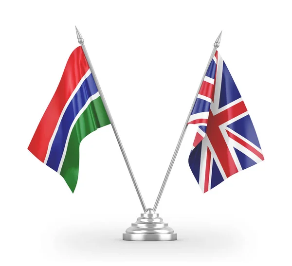 Bandeiras de mesa do Reino Unido e Gâmbia isoladas em renderização 3D branca — Fotografia de Stock