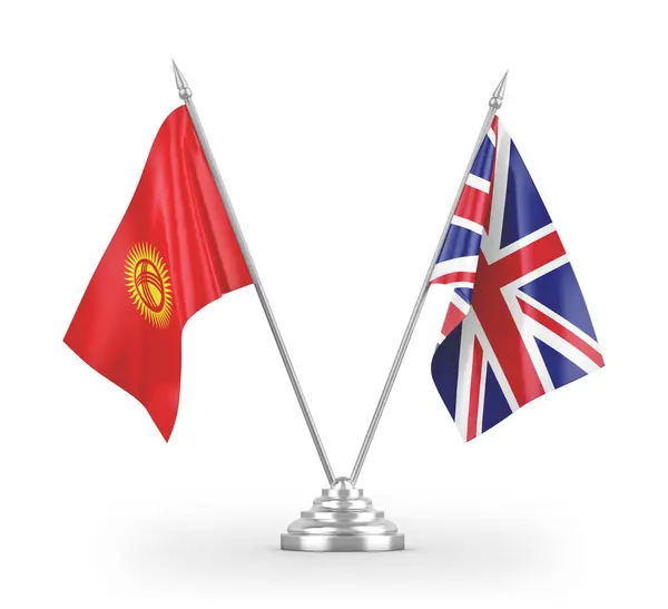 Bandeiras de mesa do Reino Unido e do Quirguistão isoladas em renderização 3D branca — Fotografia de Stock