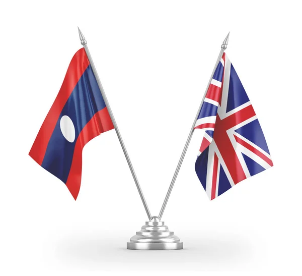 Bandeiras de mesa do Reino Unido e do Laos isoladas em renderização 3D branca . — Fotografia de Stock