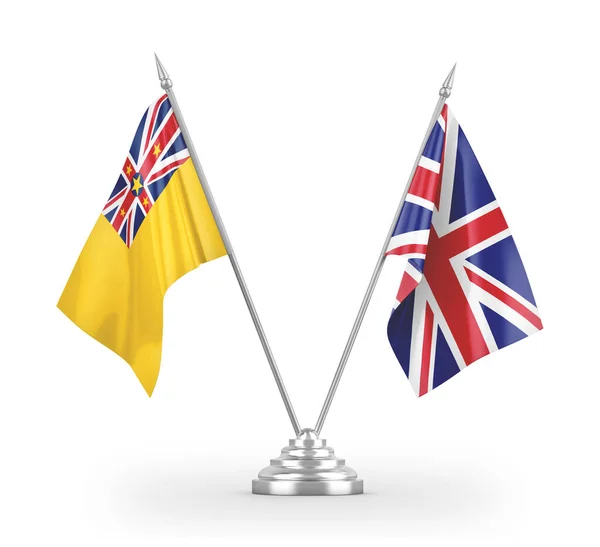 Bandeiras de mesa do Reino Unido e Niue isoladas em renderização 3D branca — Fotografia de Stock