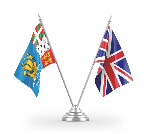 Bandeiras de mesa do Reino Unido e Saint Pierre e Miquelon isoladas em renderização 3D branca — Fotografia de Stock