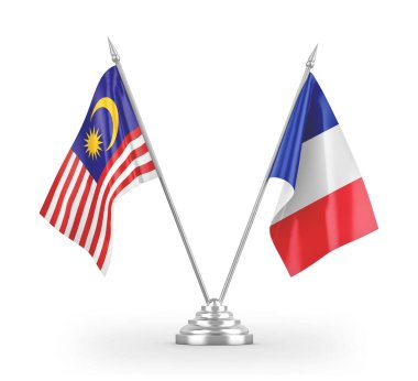 France and Malaysia table flags isolated on white 3D rendering