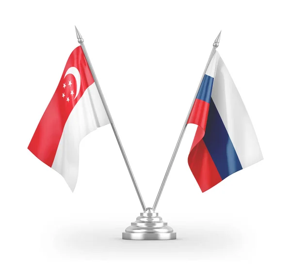 Ryssland och Singapore bordsflaggor isolerade på vit 3d rendering — Stockfoto