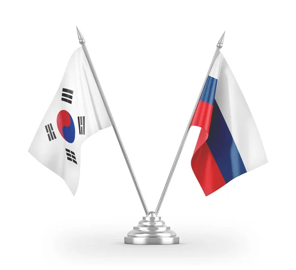 Bandiere da tavolo Russia e Corea del Sud isolate su rendering 3D bianco — Foto Stock