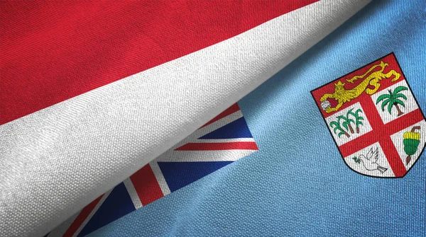 Indonesia y Fiji dos banderas tela textil, textura de la tela —  Fotos de Stock