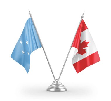 Kanada ve Mikronezya masa bayrakları beyaz 3D görüntüleme üzerinde izole edildi