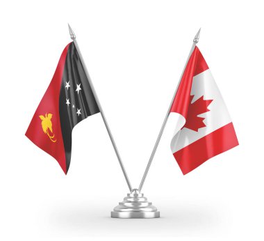 Kanada ve Papua Yeni Gine masa bayrakları beyaz 3D görüntüleme üzerinde izole edildi