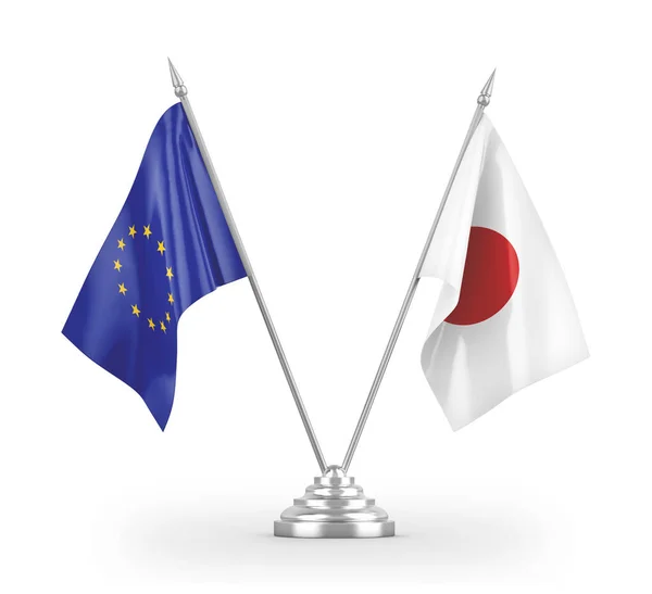 白色3Dレンダリングで分離された日本と欧州連合のテーブルフラグ — ストック写真
