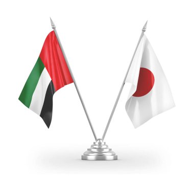 Japonya ve Birleşik Arap Emirlikleri masa bayrakları beyaz 3D görüntüleme üzerinde izole edildi