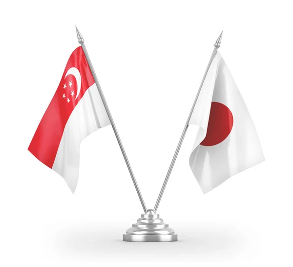 Japan och Singapore bordsflaggor isolerade på vit 3d rendering — Stockfoto