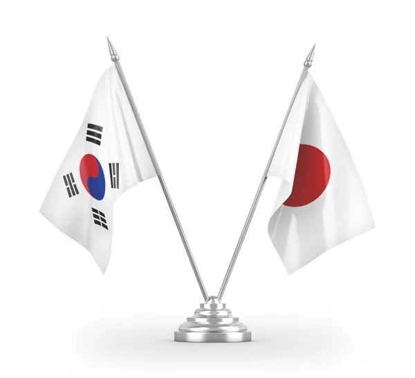 Bandiere da tavolo Giappone e Corea del Sud isolate su rendering 3D bianco — Foto Stock