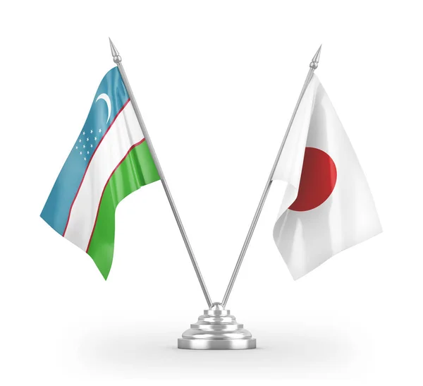 Japan and Uzbekistan table flags isolated on white 3D rendering — 스톡 사진