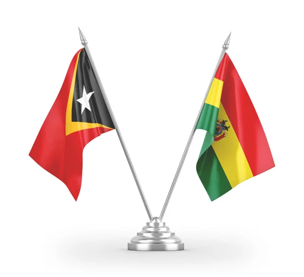 Banderas de mesa Bolivia y Timor-Leste Timor Oriental aisladas en renderizado 3D blanco —  Fotos de Stock