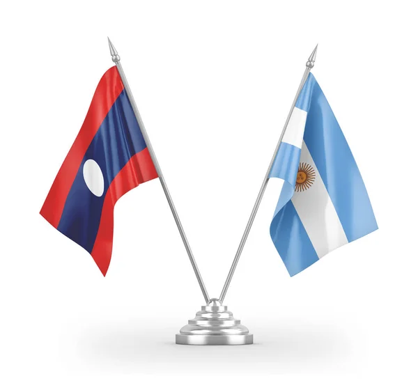 Bandiere da tavolo Argentina e Laos isolate su rendering 3D bianco . — Foto Stock