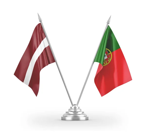 Portugal and Latvia table flags isolated on white 3D rendering — стокове фото