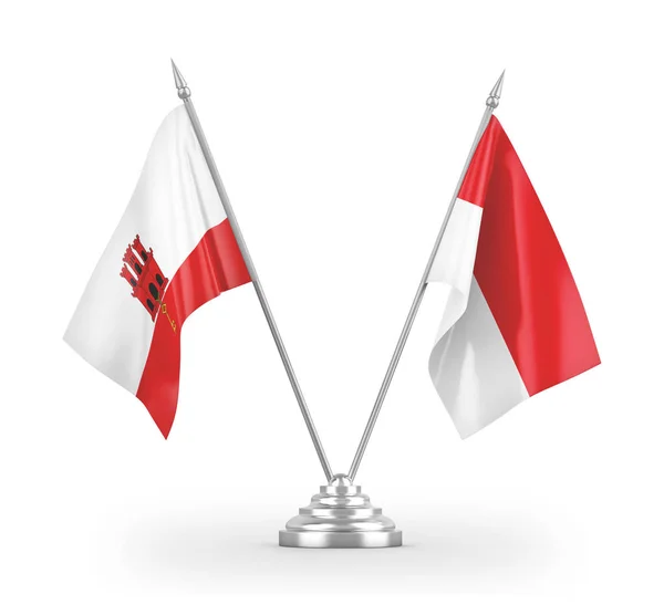 Flagi Indonezji i Gibraltaru tabeli izolowane na białym 3d renderowania — Zdjęcie stockowe