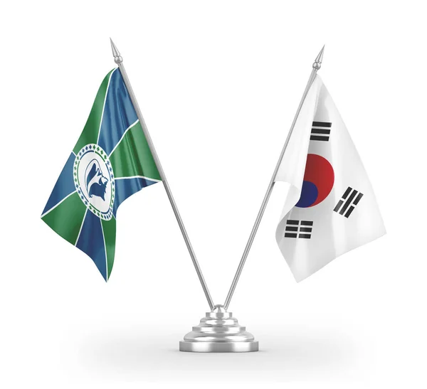 Bandiere da tavolo Corea del Sud e Martinica isolate su rendering 3D bianco — Foto Stock