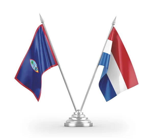 Bandiere da tavolo Paesi Bassi e Guam isolate su rendering 3D bianco — Foto Stock