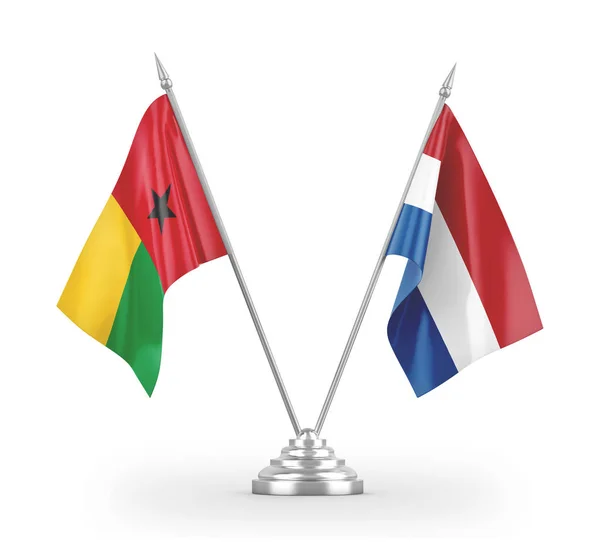 Nederland en Guinee-Bissau tafelvlaggen geïsoleerd op witte 3d-rendering — Stockfoto