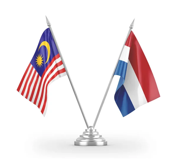 Netherlands and Malaysia table flags isolated on white 3D rendering — Stock Photo, Image