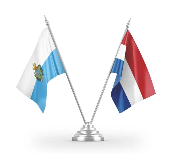Bandiere tavolo Paesi Bassi e San Marino isolate su rendering 3D bianco — Foto Stock
