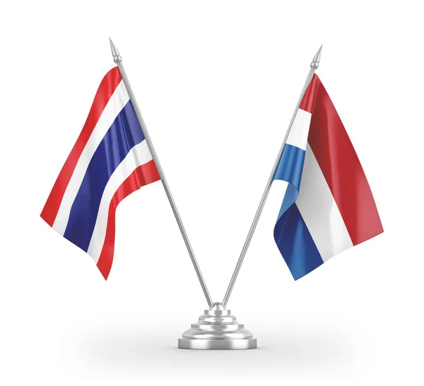 Bandiere da tavolo Paesi Bassi e Thailandia isolate su rendering 3D bianco — Foto Stock