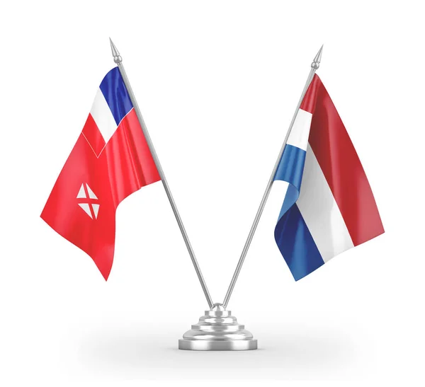 Paesi Bassi e bandiere da tavolo Wallis e Futuna isolate su rendering 3D bianco — Foto Stock