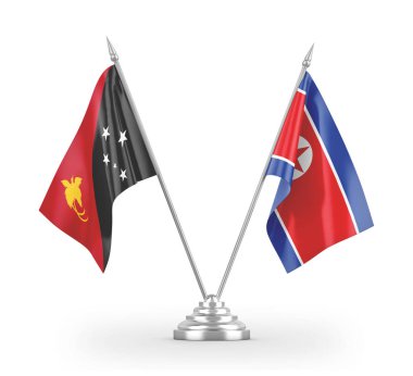 North Korea and Papua New Guinea table flags isolated on white 3D rendering