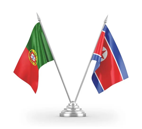 North Korea and Portugal table flags isolated on white 3D rendering — ストック写真