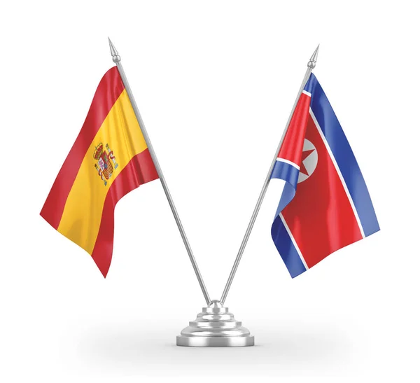 North Korea and Spain table flags isolated on white 3D rendering — 스톡 사진