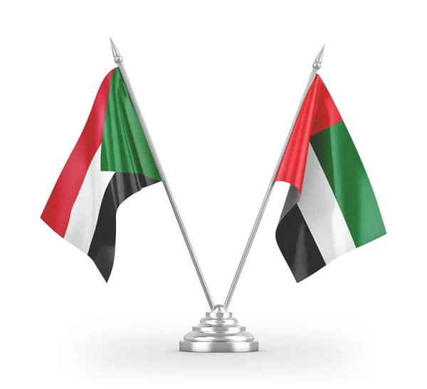 Banderas de mesa de los Emiratos Árabes Unidos y Sudán aisladas en renderizado 3D blanco —  Fotos de Stock