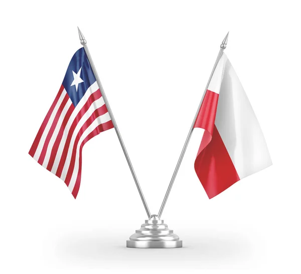 Flagi stołowe Polski i Liberii izolowane na białym trójwymiarowym rysunku — Zdjęcie stockowe