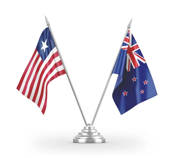 New Zealand and Liberia table flags isolated on white 3D rendering — Stock Photo, Image