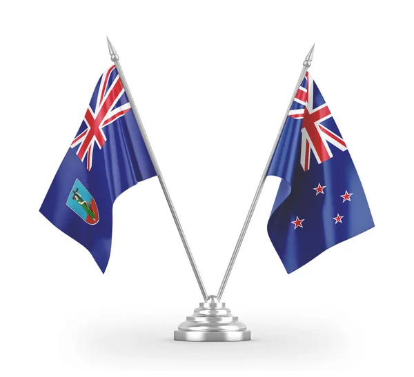 Új-Zéland és Montserrat asztali zászlók izolált fehér 3d renderelés — Stock Fotó