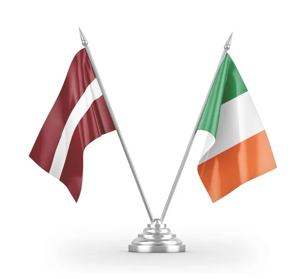 Ireland and Latvia table flags isolated on white 3D rendering — Stok fotoğraf