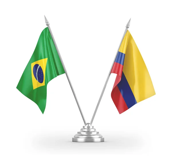 Επιτραπέζιες σημαίες Κολομβίας και Βραζιλίας που απομονώνονται σε λευκή 3d απόδοση — Φωτογραφία Αρχείου