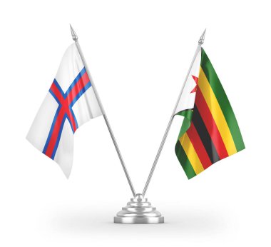 Zimbabwe ve Faroe Adaları masa bayrakları beyaz zemin üzerinde izole edilmiş 3D görüntüleme