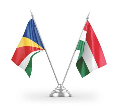 Macaristan ve Seyşeller masa bayrakları beyaz zemin üzerinde izole edilmiş 3D görüntüleme