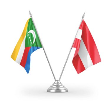 Avusturya ve Comoros masa bayrakları beyaz arkaplanda izole edilmiş 3D görüntüleme 
