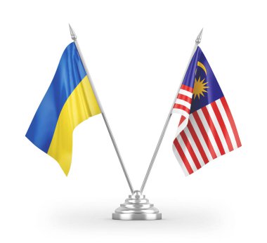 Beyaz arkaplan üzerinde izole edilmiş Malezya ve Ukrayna masa bayrakları