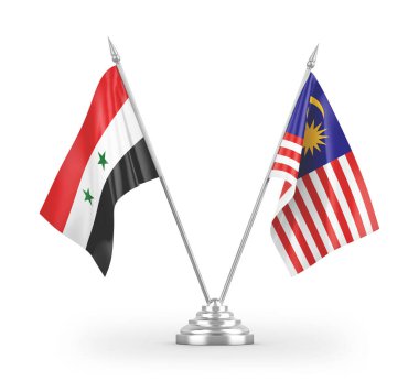 Beyaz arkaplan üzerinde izole edilmiş Malezya ve Suriye masa bayrakları