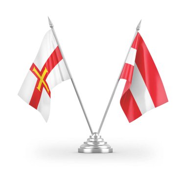 Avusturya ve Guernsey masa bayrakları beyaz zemin üzerinde izole edilmiş 3D görüntüleme
