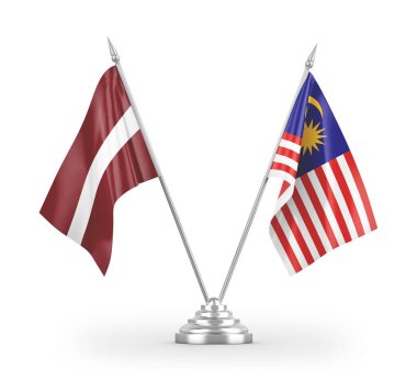 Beyaz arkaplan üzerinde izole edilmiş Malezya ve Letonya masa bayrakları 3d