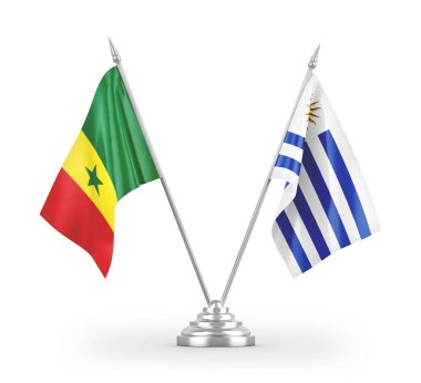 Beyaz arkaplan üzerinde izole edilmiş Uruguay ve Senegal masa bayrakları 3d